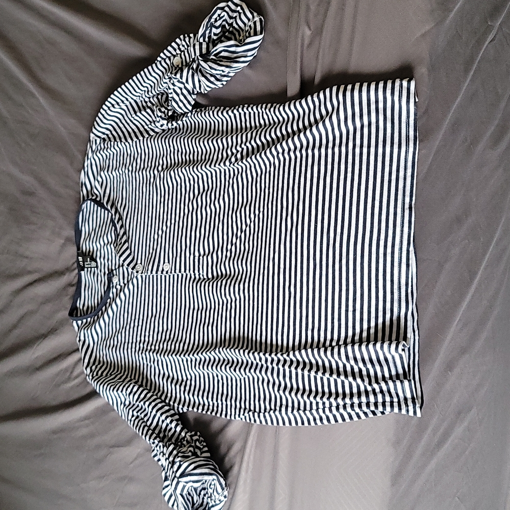Mens h&m black and white striped shirt. Button sleeve size medium